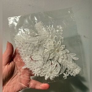Super pretty brand new white lace floral wedding garter!